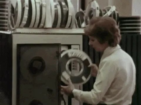 Office with old computers and desk phones -- gif provided by the government of Ontario